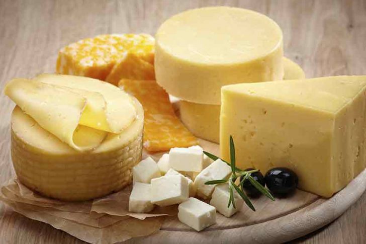 cheeses on round board